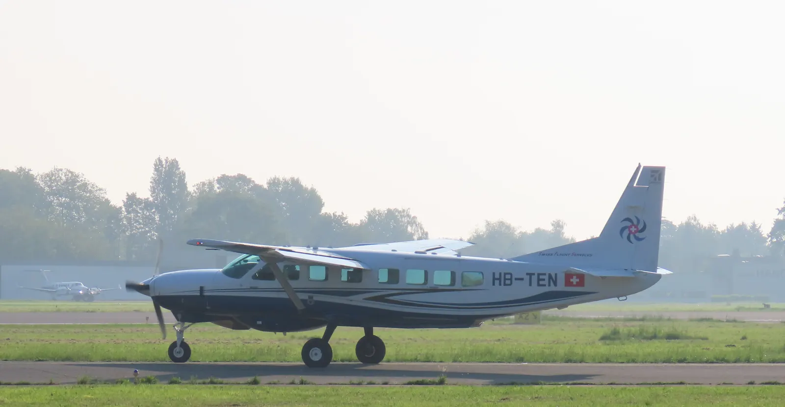 Cessna 208B Grand Caravan EX side view at Antwerp